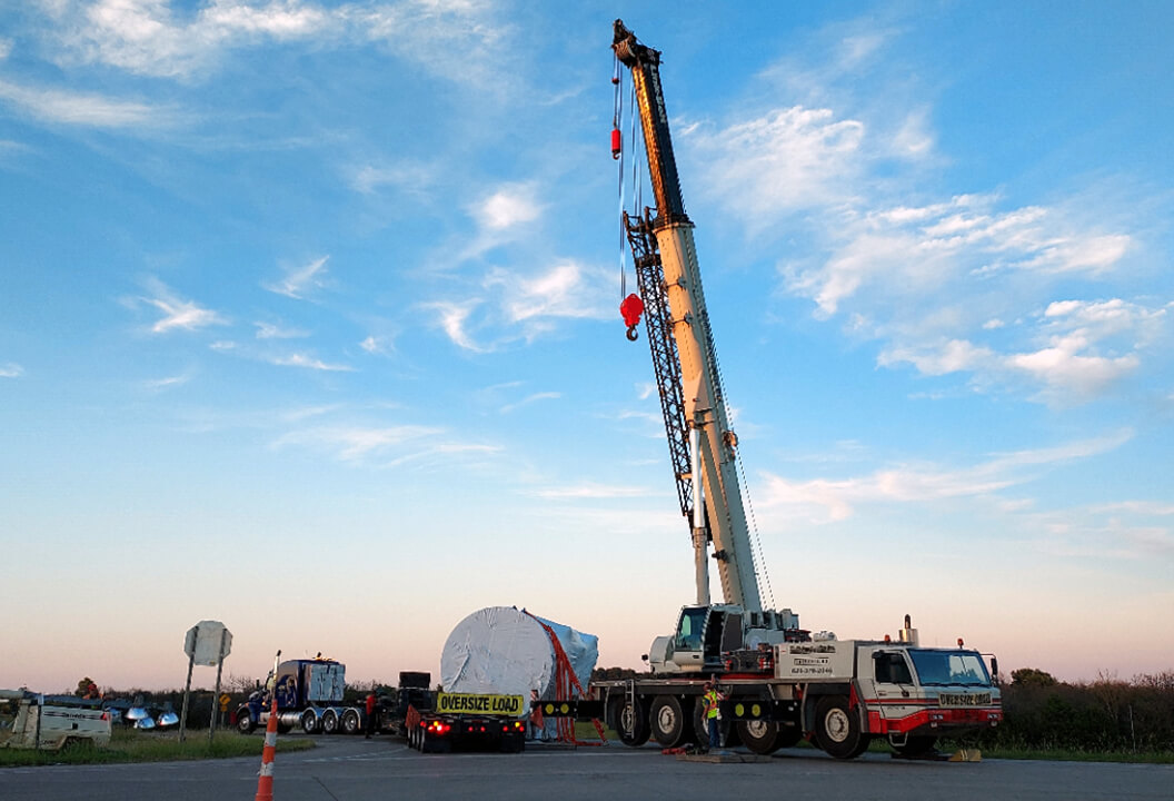 A Tindle Construction crane in action at an industrial facility in Southeast Kansas, demonstrating expert rigging services in Fredonia, Kansas.
